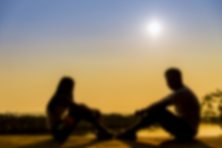 Lovely Couple sit and look together with romance scene in Blur styleの写真素材