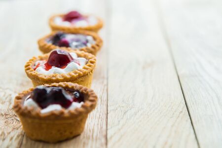 Strawberry and Blueberry tart on wooden floor 2の写真素材