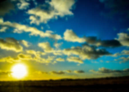 Sunset in Field of country side in Blur styleの写真素材