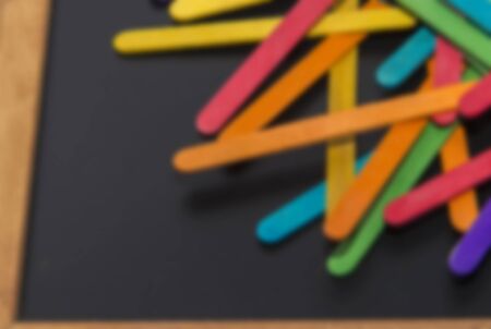 Variety color of wooden stripe on black board in Blur styleの写真素材
