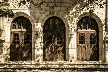 Three classic wooden church door in Sepia styleの写真素材