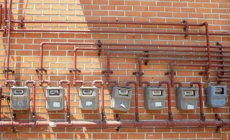 Row of Electric meter on the wallの写真素材