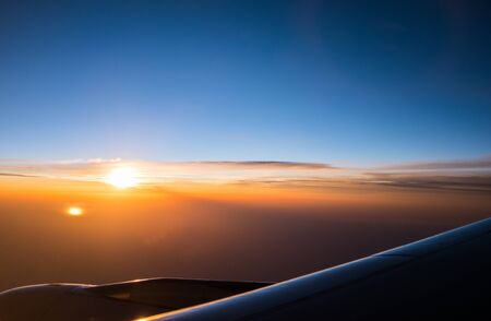 Sunrise view from window airplane in Abstract styleの写真素材