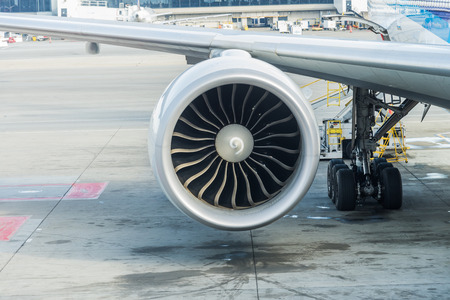 Jet engine of Air plane with runway backgroundの写真素材