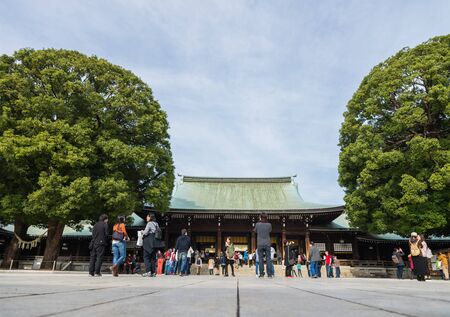 Tourist see classic wooden shrine Meiji Shinto Temple in Shibuya Japanのeditorial素材