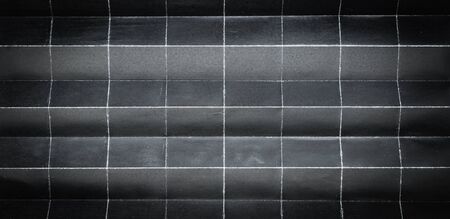Background pattern of folded black paper in 64 partsの写真素材