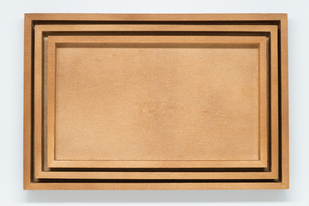 Three wooden tray on white background and selective focus