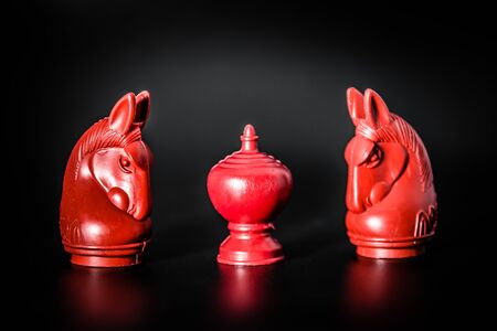 Two Red Thai Knight and King chess piece on Black background with selective focusの写真素材