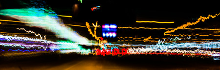 Colorful Abstract Defocused motion blurred speed light trails inside Car in Night sceneの写真素材