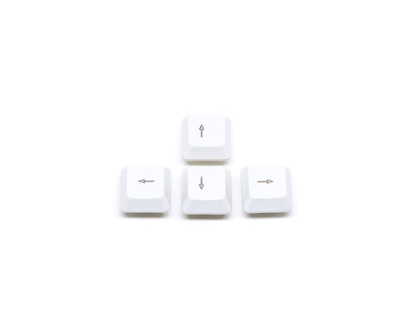 Four white keyboard arrow button isolated on white backgroundの写真素材