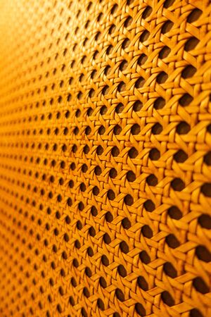Woven rattan bamboo weaving texture background pattern perspective vertical view concept designの写真素材