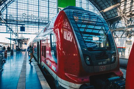 FRANKFURT, GERMANY - OCTOBER 12 Passenger walk to Train of Deutsche Bahn Railway transport on October 12, 2019. Deutsche Bahn Railway transport is the second largest transport company in the world. Passengers use this transport more than 5 billionのeditorial素材