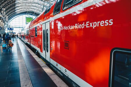 FRANKFURT, GERMANY - OCTOBER 12 Passenger walk to Train of Deutsche Bahn Railway transport on...