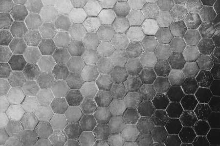 Black and white of Hexagon shape brick wall architecture exterior design for Abstract texture background concept ideaの写真素材
