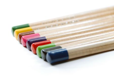Color pencils closeup isolated on white background