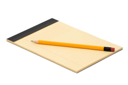 notebook and pencil isolated on white backgroundの写真素材