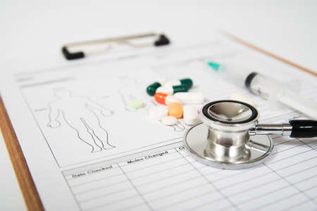 Stethoscope on a medical form. Healthcare conceptの写真素材
