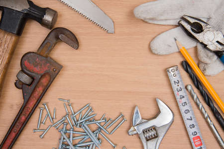 Construction Tools On Wooden Deskの写真素材