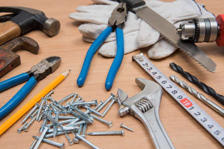 Construction Tools On Wooden Deskの写真素材