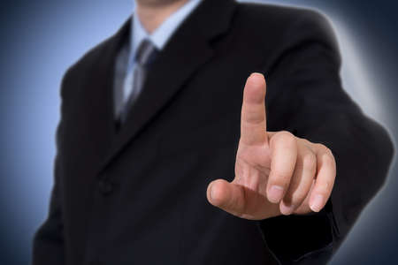 Business man touching imaginary screen.の写真素材