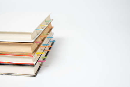 close up of book marked with placeholders on white backgroundの写真素材