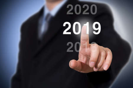Businessman pointing year 2019. Businessman new year conceptの写真素材