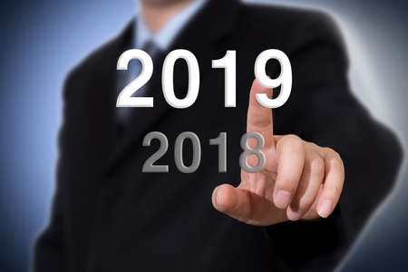 Businessman pointing year 2019. Businessman new year conceptの写真素材