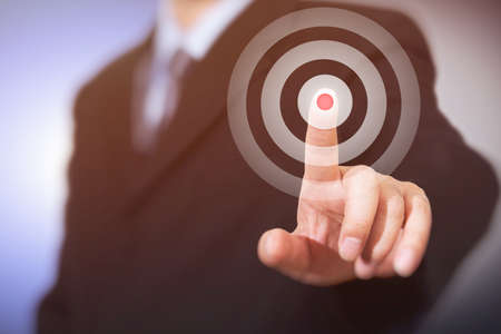 Businessman click on target. Business concept.の写真素材