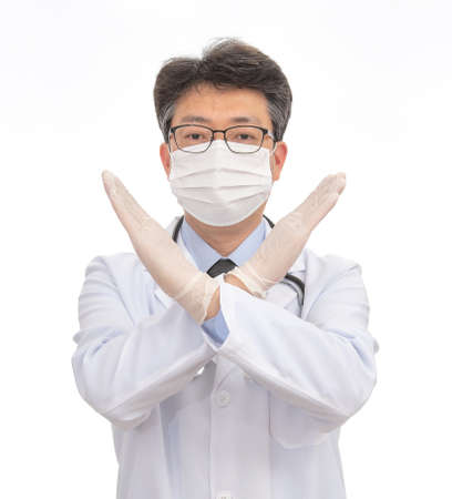 an Asian doctor wearing a mask. isolated on white background.の写真素材