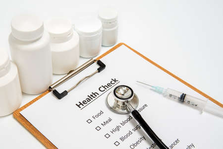Health concept with clipboard and health check related itemsの写真素材