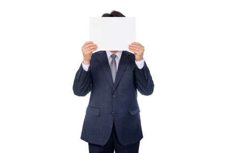 Portrait of Asian businessman holding blank message board.の写真素材