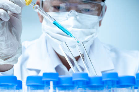 Asian male researcher working in the laboratory.の写真素材