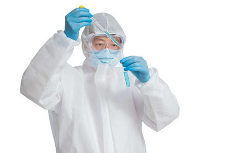 An Asian man wearing a protective suit, protective face masks, and safety glasses on a white background.の写真素材