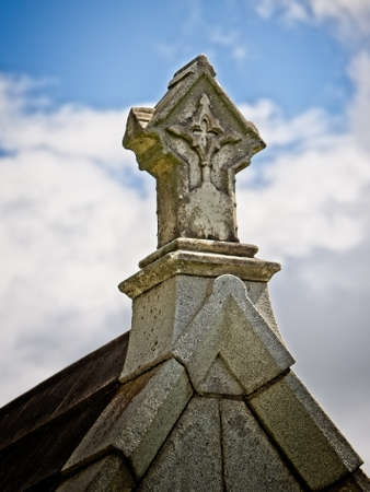 New Orleans, LA USA - Jun 2, 2017  -  Cross on top of a Tomb 3
