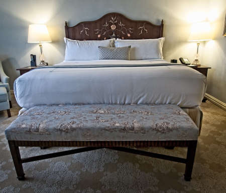 New Orleans, LA USA - May 28, 2017  -  Bed in a hotel in New Orleans with a interesting headboardのeditorial素材