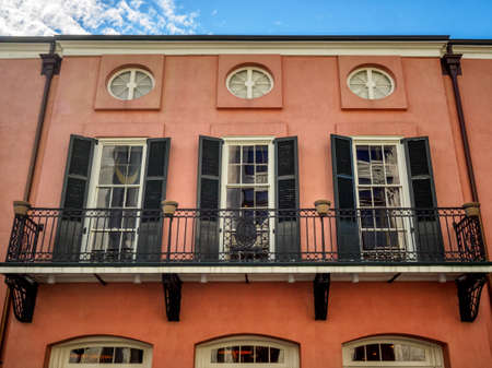 New Orleans LA USA -  Sep. 13, 2016  -  This is a a old building with Green Shutters in the French Quarter of New Orleans LA.  There are many interesting old buildings that are 150+ years old in this location.のeditorial素材