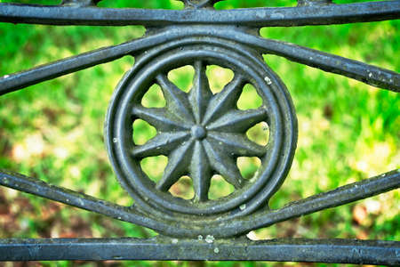 Conroe TX USA - Aug. 17, 2017  -  Pattern in an Old Iron Bench that is Located in a 1800's Cementeryのeditorial素材