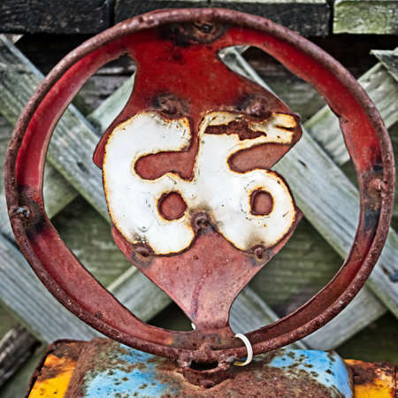 Spring TX USA - 03/02/2018  -  Steel Art of the number 66 in a circle found outside a building in Old Town TX USAのeditorial素材