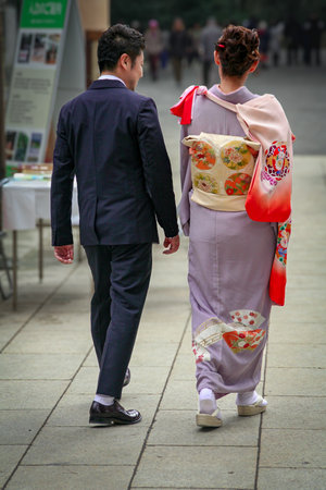 Walking woman in Japanese kimonoの写真素材
