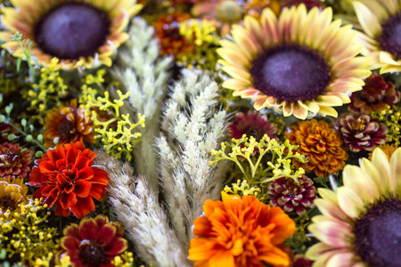 Full frame shot of yellow and orange flowersの写真素材