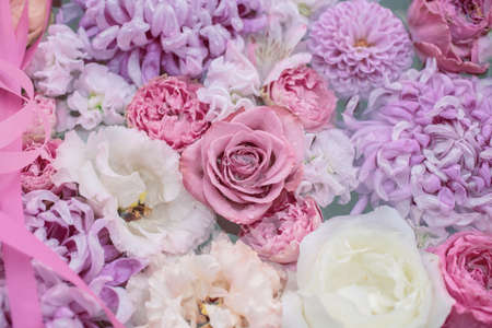 Flowers composition in vintage color tone. Floral texture made of pink and white flower.の写真素材