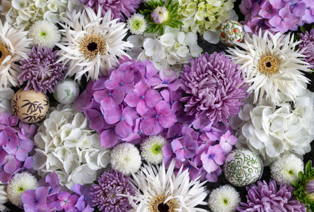 Hydrangea, chrysanthemum and gerbera. Arrangement of purple and white flowers.の写真素材