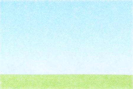 Illustration of grassland and blue sky drawn with colored pencilsの写真素材