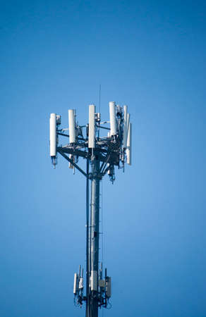 Cell phone tower on Blue Sky Backgound