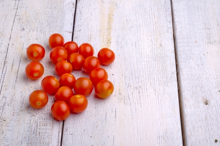 Fresh sweet tomato on the wooden tableの写真素材