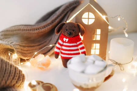 New Year and a toy dog. View from above. The symbol of the new year 2018 a dog. New Year composition on a white background.の写真素材
