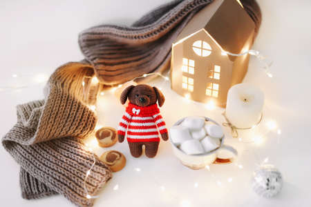 New Year and a toy dog. View from above. The symbol of the new year 2018 a dog. New Year composition...