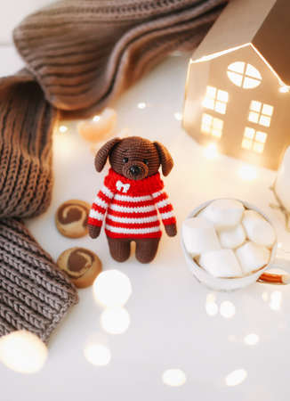 New Year and a toy dog. View from above. The symbol of the new year 2018 a dog. New Year composition on a white background.の写真素材