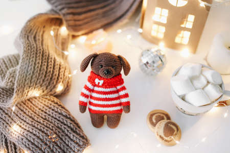 New Year and a toy dog. View from above. The symbol of the new year 2018 a dog. New Year composition on a white background.の写真素材