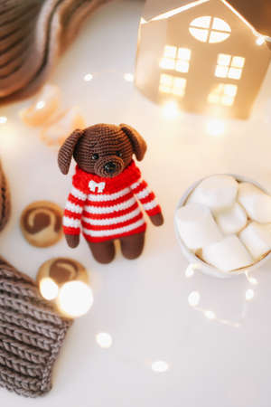 New Year and a toy dog. View from above. The symbol of the new year 2018 a dog. New Year composition on a white background.の写真素材